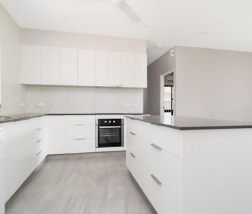 STYLISH FAMILY HOME ON A PRIVATE CORNER BLOCK! - Photo 6