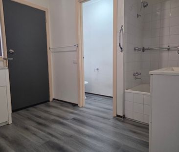 Charming and low-maintenance 2-bedroom unit. Ready to call home. - Photo 1