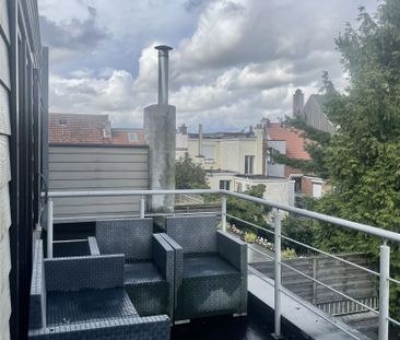 Centraal gelegen 2-slaapkamerappartement met terras. - Foto 4