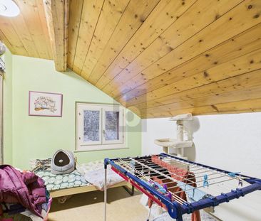 VERY CHARMING AND WELL-MAINTAINED ON TWO LEVELS - Photo 3