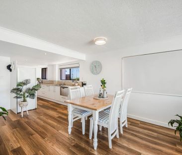 Elevated Coastal Apartment Living - Photo 3