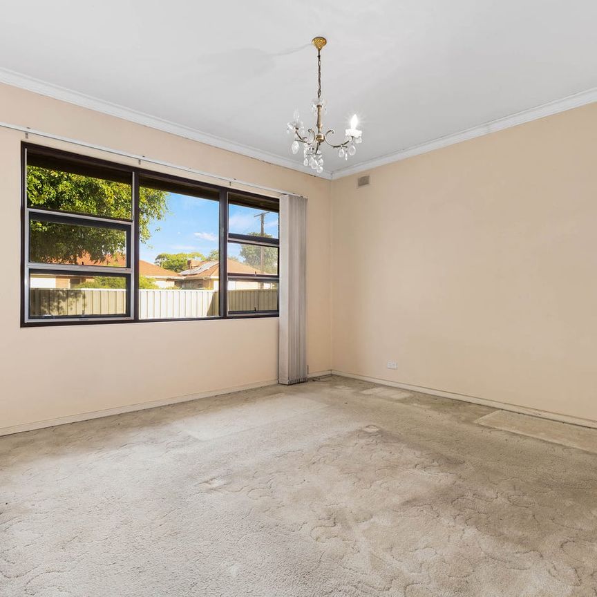 Spacious Family Home with Large Yard in a Convenient Location - Photo 1