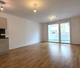 Neubauwohnung mit großer Loggia / Deckenkühlung / 1.OG // Ab JULI!! - Photo 1