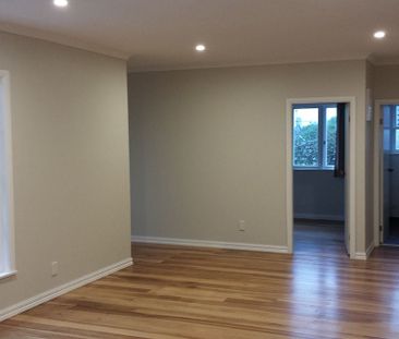 Charming 3BR Home with Deck & Garden - Photo 2