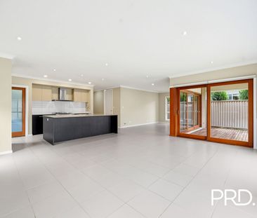 Stunning Family Home Packed with Space, Style & Convenience - Photo 1