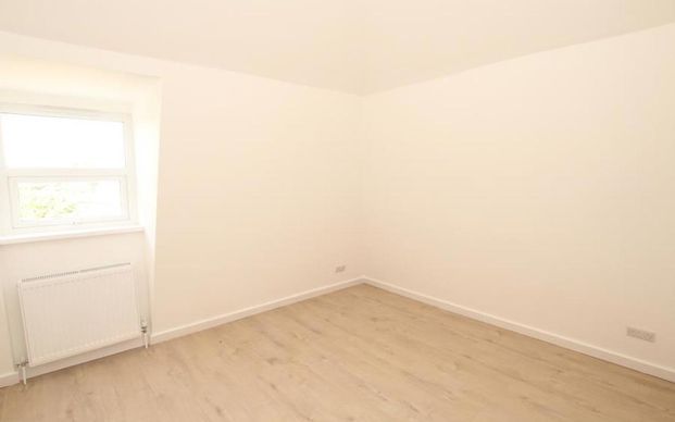 A lovely top floor flat available to rent within the 'Stapleton Tavern' development. - Photo 1