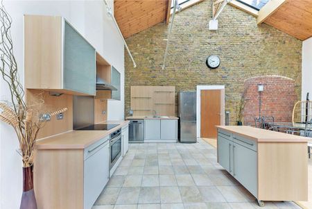 Spacious and full of character, this remarkable two-bedroom property offers an outstanding blend of character and contemporary style. - Photo 2