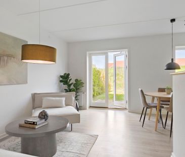 Dejligt rækkehus i Holluf Pile med have og gratis parkering - Foto 1