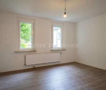 Sanierte Zwei-Zimmer-Wohnung mit Einbauküche im Ortskern von S-Möhr... - Foto 1