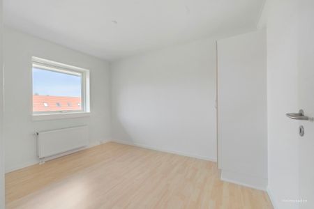 Dejligt rækkehus i Holluf Pile med have og gratis parkering - Photo 4