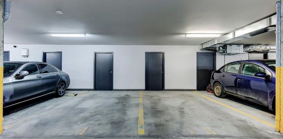 unité de coin située au rez-de-chaussée DEUX ESPACES DE STATIONNEMENT - Photo 2