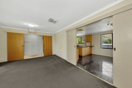 Stunning Three Bedroom Family Home with Pool, Solar and Large Gardens in a Prime Location! - Photo 4