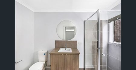 This brand-new, contemporary three-bedroom home - Photo 3