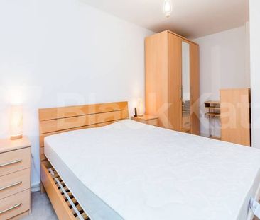 1 bedroom apartment located within a gated development with a balcony - Photo 6