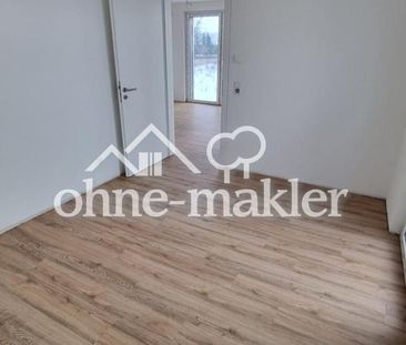 Erstbezug in Voxtrup: Exklusive 2ZKB EG-Wohnung mit Terrasse + Stel... - Photo 3