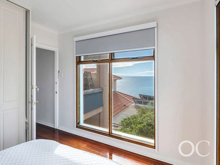 Open the Door to Fully Furnished Coastal Retreat with Breathtaking Ocean Views - Photo 5