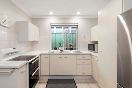 All-Season Family Retreat with Heated Pool & Dual Living – Walk to CHAC, Shops & Transport - Photo 5