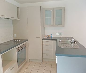 Townhouse Living in fully gated complex with 2 carparks - Photo 2