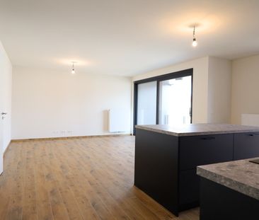 Nieuwbouwappartement met terras en 2 autostaanplaatsen - Photo 1