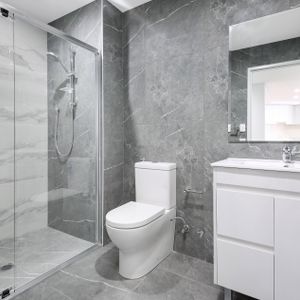 Modern two bedroom unit - 20% below market rent - Photo 2