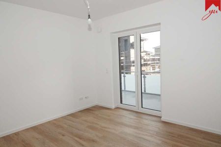 Lichtdurchflutete Obergeschosswohnung in zentraler Lage von Wiesmoor! Neubau- Erstbezug - Photo 5