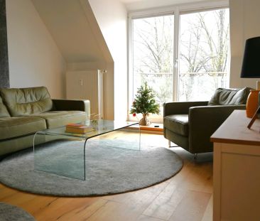 Exklusive Dachgeschosswohnung mit großer Terrasse – Ruheoase im Her... - Photo 3