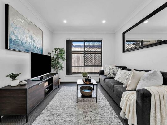 Modern 4-Bed Family Home with Dual Living Spaces in Vibrant Yarrabilba - Photo 1