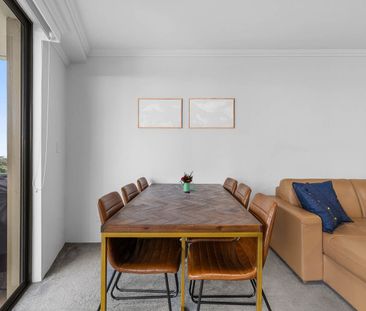 Sleek 2-bedroom apartment in a resort style complex - Photo 3