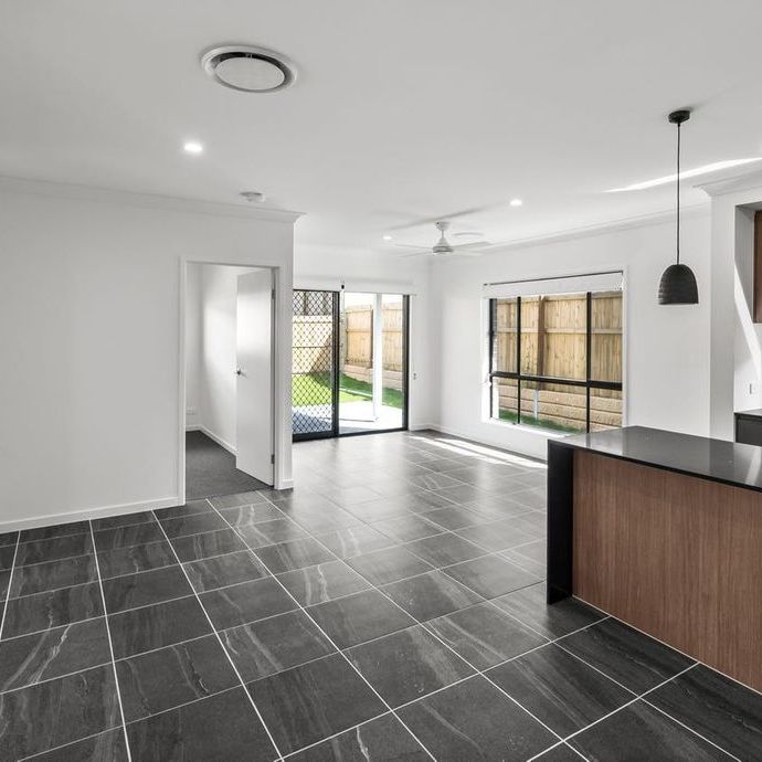 Modern Family Home in Sought-After Greenbank Estate - Photo 1