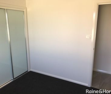 NEAR NEW 4 BEDROOM HOME - Photo 6