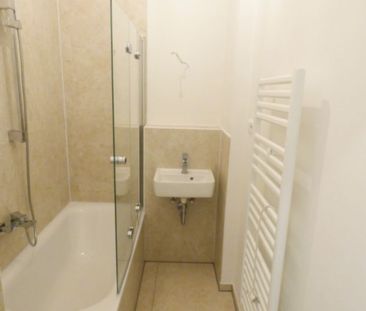 ** Modernisierte Wohnung mit großer Wohnküche in zentraler Lage von... - Photo 4