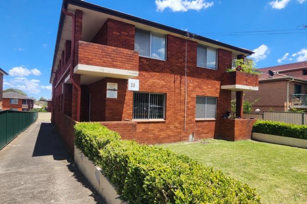 CONVENIENTLY LOCATED TWO BEDROOM UNIT - Photo 1