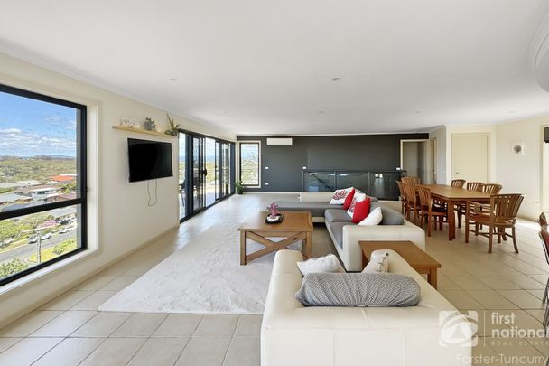 Coastal Luxury with Panoramic Views Over One Mile Beach - Photo 1