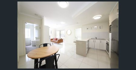 MAKE THIS STLISH AND COMFORTABLE 2-BEDROOM HOME YOUR OWN - Photo 2