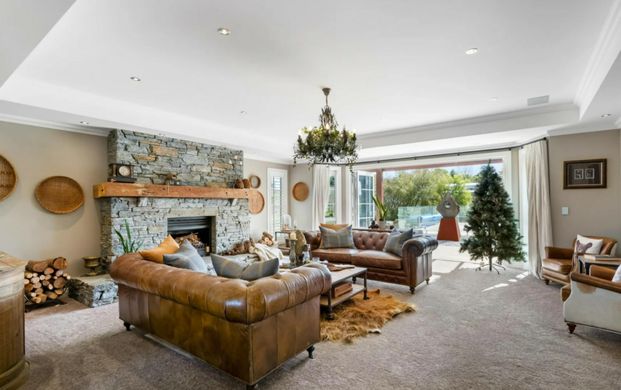 Five-Bedroom Lifestyle Home with Pool, Multiple Living & 4-Car Garage - Photo 1