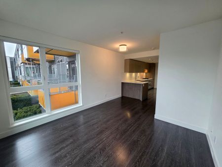 Stylish One Bedroom + Den Residence with Private Balcony - Photo 3