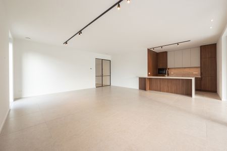Prestigieus nieuwbouwappartement met ruime tuin en terras - Photo 4