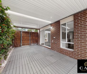 Stylish & Low-Maintenance Home with Entertainer’s Appeal - Photo 1