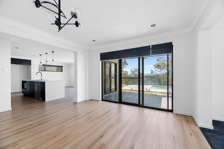 Stunning Modern 6 Bedroom Home in Coomera Waters with Pool - Photo 3