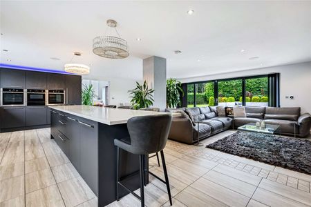 An exceptional architect designed residence set within a 0.75 acre plot, enjoying far-reaching countryside views and offering 3156 sq ft of contemporary living through. - Photo 3