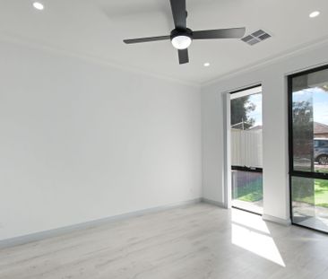 Modern Spacious Home in a Fantastic Location! - Photo 1