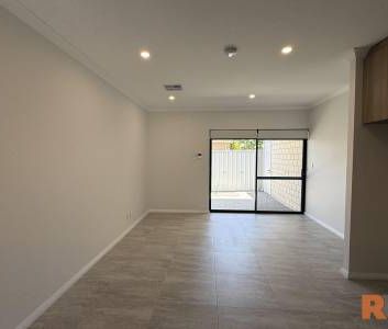 Stylish Brand New Home Offering Low-Maintenance Living - Photo 1