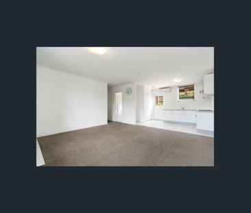 Neat & Spacious 2-Bedroom Unit in Prime Location - Photo 1