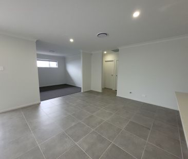 Spacious 4-Bedroom Home in the Endeavour Estate - Photo 2