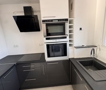 T4 de 70m2 refait à neuf au calme avec terrasse , cave et parking - Photo 6