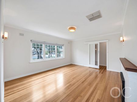 Open the Door to Classic Comfort Just Steps from the Coast - Photo 3
