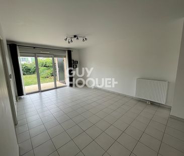Appartement 2 pièces de 59m² - Photo 1