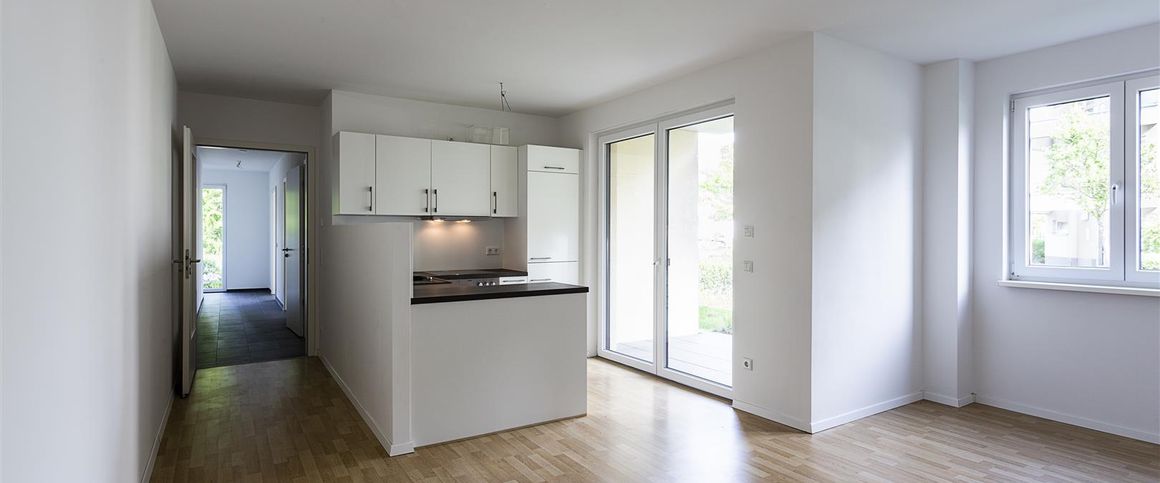 Traumhafte Familienwohnung in grüner Wohnanlage - Photo 1