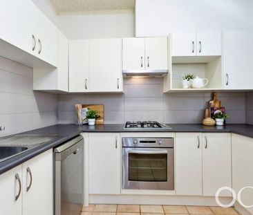 Open the Door to Easy Two-Level Living Close to the CBD - Photo 2