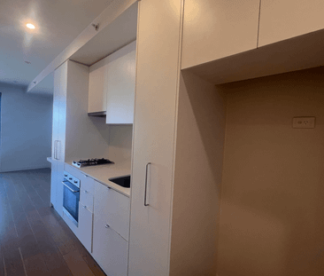 Modern One-Bedroom Apartment in a Highly Sought-After Complex - Photo 2